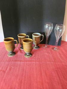 lot 1280 image: Four Porcelain Irish Coffee Footed Mugs, two champagne glasses
