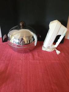 lot 1281 image: Vintage West Bend Penguin hot, cold server, and a Sunbeam hand mixer missing the beater bars