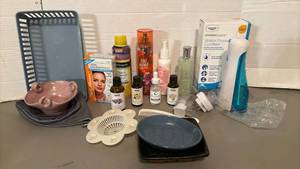 lot 1506 image: Bathroom Lot, including Cordless Water Flosser, hair removal kit, essential oils, room sprays and more