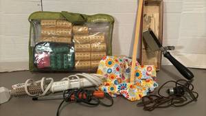 lot 1508 image: Vintage electric trouser press, hair curlers, curling irons and more