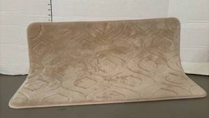lot 1510 image: Nice Quilted Bath Mat Tan Geometric Pattern 31 inches by 20 inches