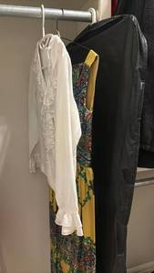 lot 1601 image: Womens Clothing Lot White Ruffled Blouse, Patterned Dress, Black Garment Bag - Size 8