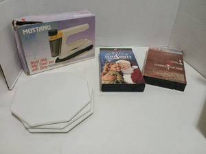 lot 1827 image: Mustang World Wide Mini Travel Iron with Vhs