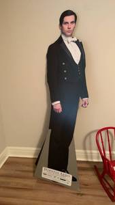 lot 2003 image: Downton Abbey Cardboard Cutout Standup Figure 6 ft located in basement