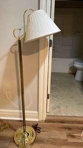 lot 2008 image: Floor Lamp with White Pleated Shade and Brass Base 54 inches tall located in basement