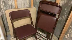 lot 2108 image: Card table 30X30 and 4 Folding Chairs with Padded Seats located in basement