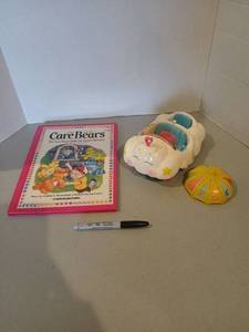 lot 3102 image: Care Bears Cloud Car with Book missing pole to attach umbrella to car