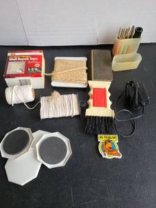 lot 3434 image: String, sanding block, furniture sliders, mini screwdriver kit.