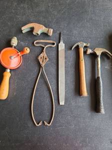 lot 3451 image: Hand drill, Harrington ice company ice tongs, file, hammers.