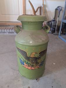 lot 3502 image: Green Metal Milk Can with Eagle and American Flag Motif 14x24h