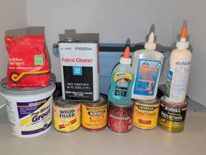 lot 3512 image: Lot of 11 Home Improvement Products Wallpaper Paste, Fabric Cleaner, Wood Filler, Stain, Finish, Polyurethane, School Glue, Caulk