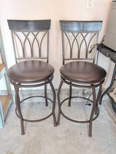 lot 3519 image: Wood and metal swivel seat barstools (3) 39 x 17 x 17 in. Floor to seat measures 24 in tall.