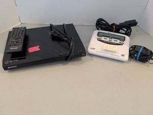 lot 3521 image: Sony DVP-SR210P CDDVD Player and Midland Weather Radio Lot