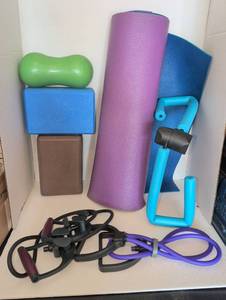 lot 3538 image: Yoga mats, yoga blocks, resistance bands and thigh toner