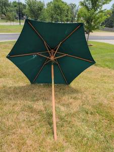 lot 3542 image: Green Patio Umbrella with Wood Pole and Ribs