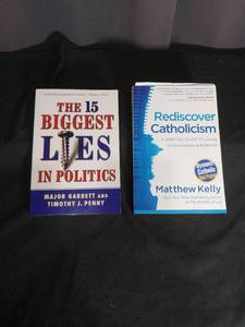 lot 7040 image: 2 Books The 15 Biggest Lies in Politics by Garrett & Penny, Rediscover Catholicism by Kelly