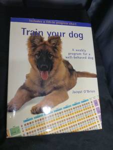 lot 7050 image: Train Your Dog by Jacqui OBrien, Weekly Program with Fill-In Progress Chart