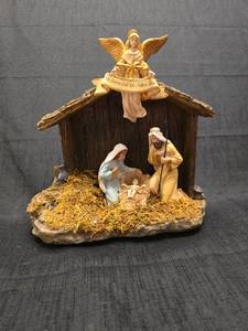 lot 1380 image: San Francisco Music Box Company Nativity Scene Figurine with Angel