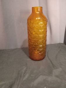 lot 6874 image: Amber Glass Bottle with Quilted Pattern 13 inches