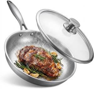lot 4234 image: 11.8 Titanium Frying Pan with Lid, Non-Stick Hammered Skillet  3-Ply Heats Fast &amp Evenly, PFASPFOAPTFE Free, Scratch-Resistant, for Induction &amp Gas, Oven-Safe to 500 F, Dishwasher Safe - Retail $65.99