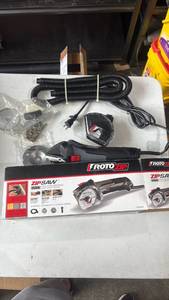 lot 204 image: RotoZip RFS1000-20B 7 Amp 4 in. ZipSaw Cut-Off Saw with Storage Bag
