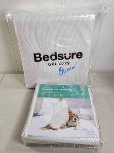 lot 229 image: Bedsure Queen Mattress Pad and Soloshine Reusable Bed Underpads Lot