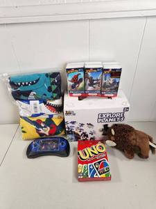 lot 236 image: Childrens Toy Lot 7 Items Games Tissues Plush Handheld Device Clothing