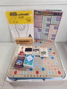 lot 237 image: Scrabble Game Lot with Dominoes, Chess Guide, Playing Cards and Signed Finger Alphabet