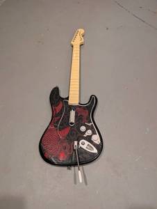lot 2001 image: Fender Rock Band Guitar Game Controller with Koi Fish Detail&nbsp