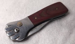 lot 2506 image: Stainless Folding Knife with Paw Detail