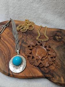 lot 3403 image: Two Pendant Necklaces with Turquoise and Carved Wood