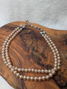 lot 3407 image: Double Strand Pearl Bracelet with Rhinestone Bow Clasp