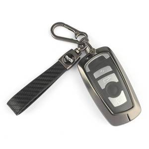 lot 7990 image: Godnee for BMW Key Fob Cover with Keychain, Metal Frame and Leather Key Shell Full Protector Fit for X1 X3 X4 X5 X6 1 2 4 5 6 7 M3 M5 M6 GT3 GT5 G30 F10 F15 F16 F20 key, Black
