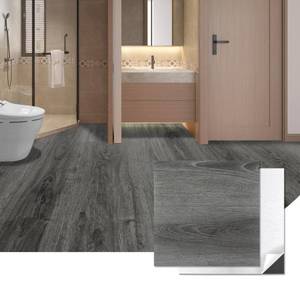 lot 8209 image: Art3d 30-Pack Peel and Stick Flooring Wood Planks, 12 x 12 in, Grey Oak - Retail $40
