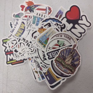 lot 73 image: I Love New York State Shaped Sticker with NYC Landmarks and Icons