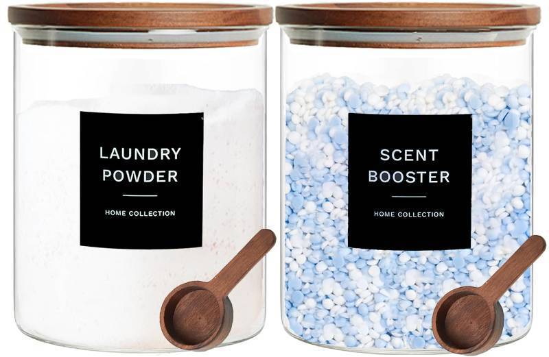 lot 38364 image: Glass Laundry Storage Containers with Acacia Lids and Scoops, 2 Pack Laundry Room Organization Jars with Labels, Powder Detergent Organizer and Laundry Pod Holder, Glass Laundry Beads Canisters Set - Retail $37
