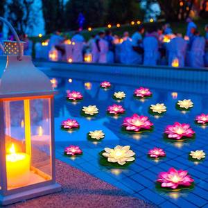 lot 1601 image: Liliful Floating Lights Lotus Floating Lanterns Artificial Lily Pads with LED Lights Battery Operated for Pool Party Garden & Pond Summer Decoration(White, Pink,3.94, 5.91 Inch) - Retail $38
