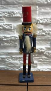 lot 32 image: Nutcracker Figurine with Red Hat and White Beard