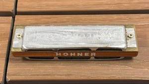 lot 73 image: Hohner Blues Harp Harmonica