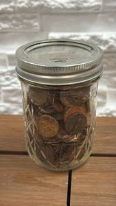 lot 92 image: Mason Jar with Mixed Coins