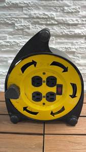 lot 112 image: Portable 4-Outlet 20�� Power Cord Reel - Yellow Black