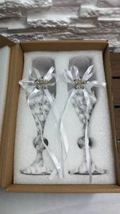 lot 139 image: Pair of White Ribbon Bow Champagne Flutes with Decorative Stem Detail