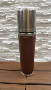 lot 155 image: Starbucks Barista Coffee Bottle with Leather Sleeve 2003