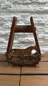 lot 173 image: Wood and Metal Western Saddle Stirrup with Horse and Barbed Wire Cutout Decor