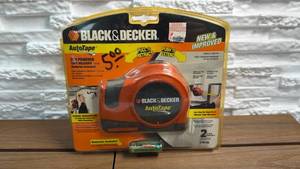 lot 209 image: Black & Decker AutoTape 25 ft Powered Tape Measure ATM100