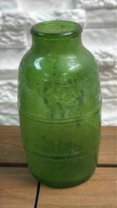 lot 219 image: Green Glass Barrel-Form Jar with Embossed Ribs