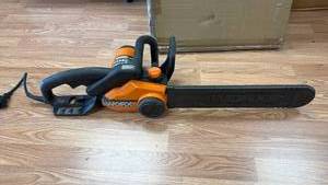 lot 325 image: WORX Corded Electric Chainsaw Orange Black