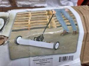 lot 335 image: Brand new 30 magnetic Sweeper with wheels. Just needs assembled.