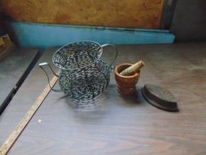 lot 3192 image: Stone mortar and pestle and metal basket