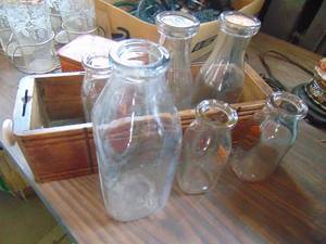 lot 3208 image: Sewing machine drawer and milk bottles